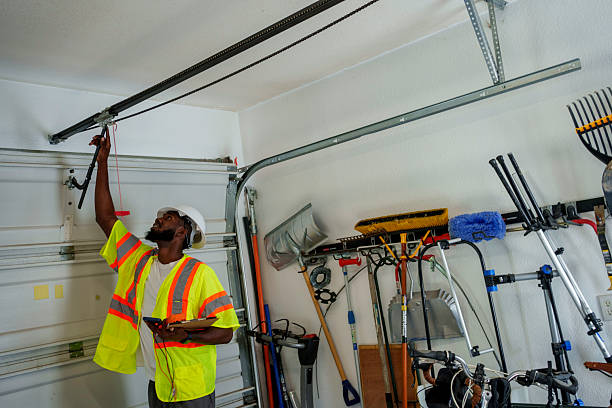 Professional Garage Door Roller Replacement technician working in Norton Shores, MI